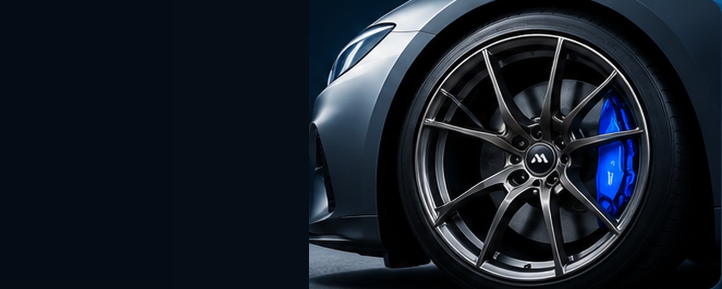 Dark multi-spoke forged wheel mounted on a performance car